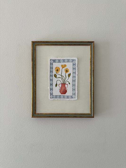 Yellow flowers in red vase, framed