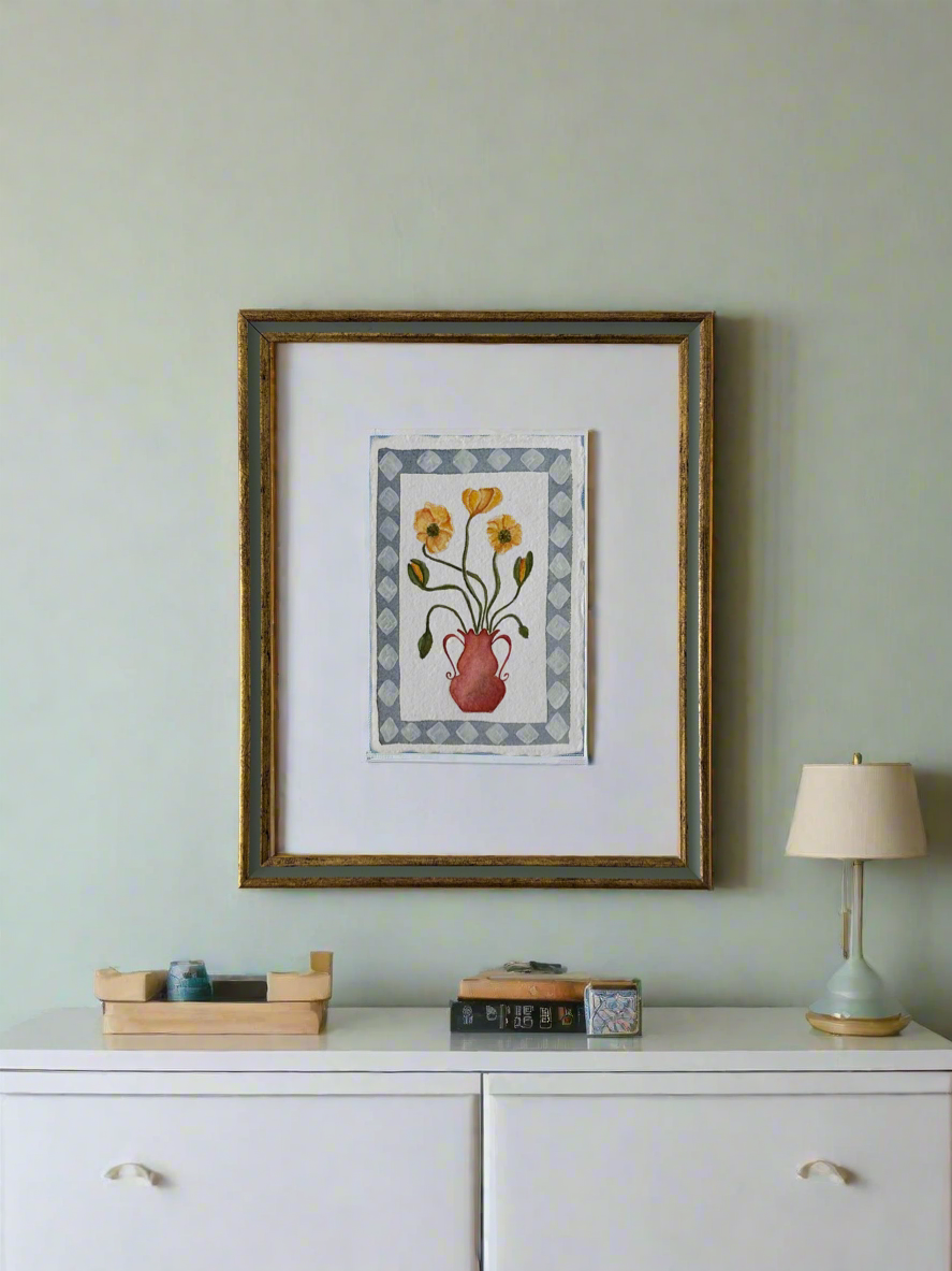 Yellow flowers in red vase, framed